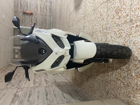 کیو جی موتور‏، NX 150‏