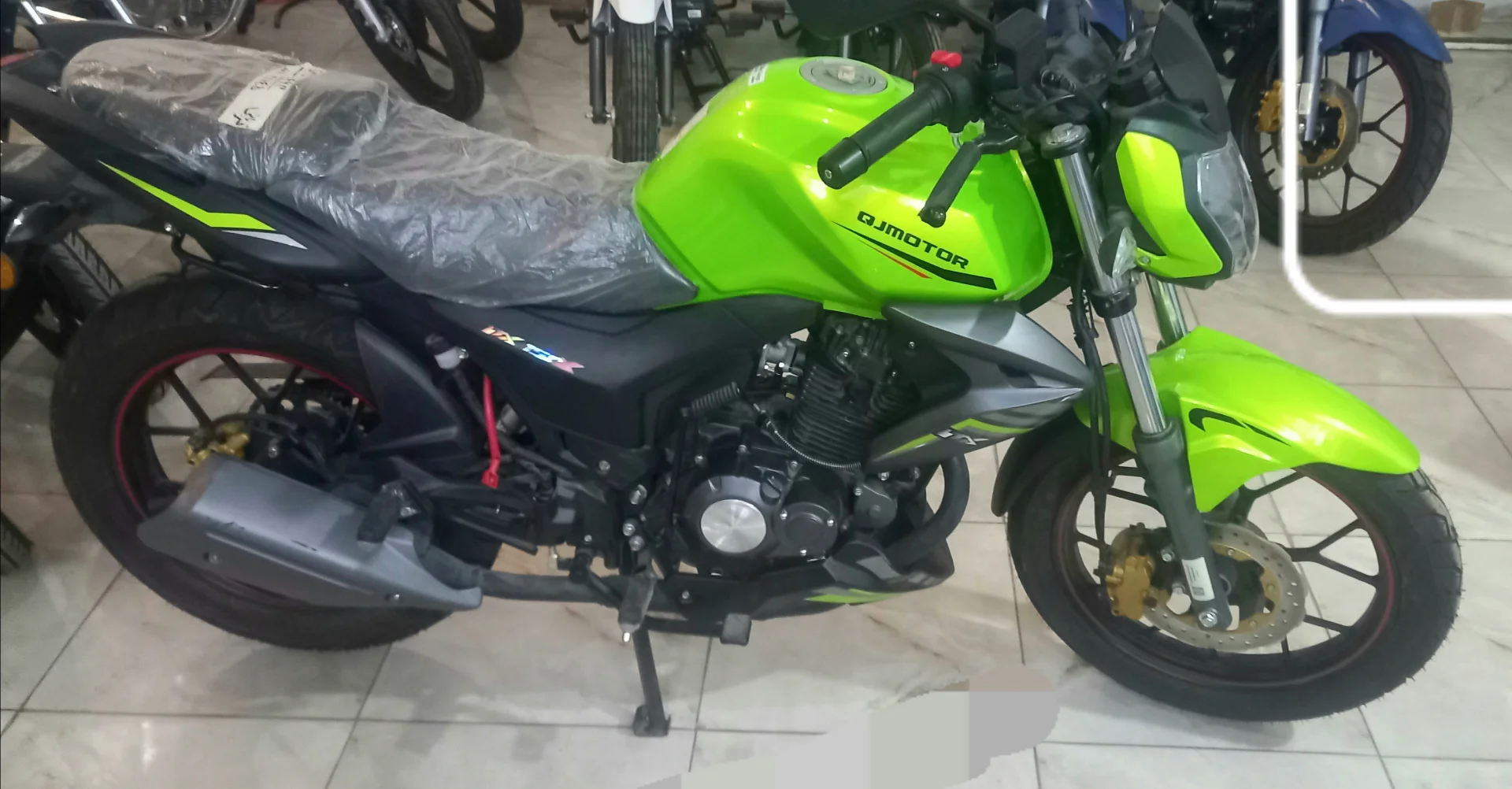 کیو جی موتور‏، NX 150‏
