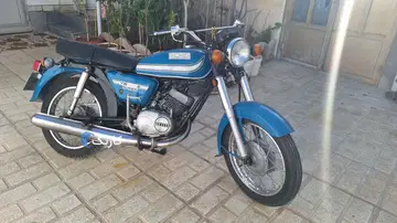 یاماها‏ YB 125‏ و سوزوکیax100